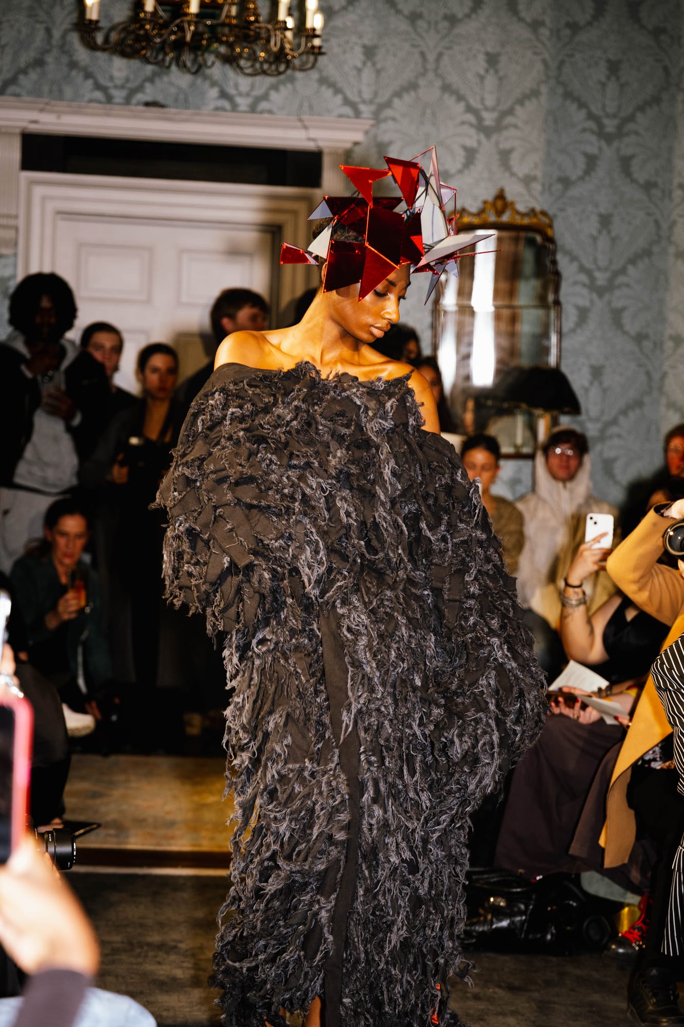 Fashion model presenting an avant-garde collection at No. 30 Knightsbridge